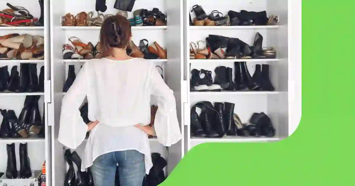 A woman standing in front of a smelly shoe rack trying to figure out how to get rid of its smell